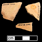 Indeterminate vessel of yellow border ware as identified by J. Pearce 1999. Glazed interior sherds on pink paste on left, and unglazed exterior sherds on right. 